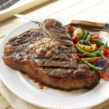 T-Bone odresci s maslacem od slanine i parmezana