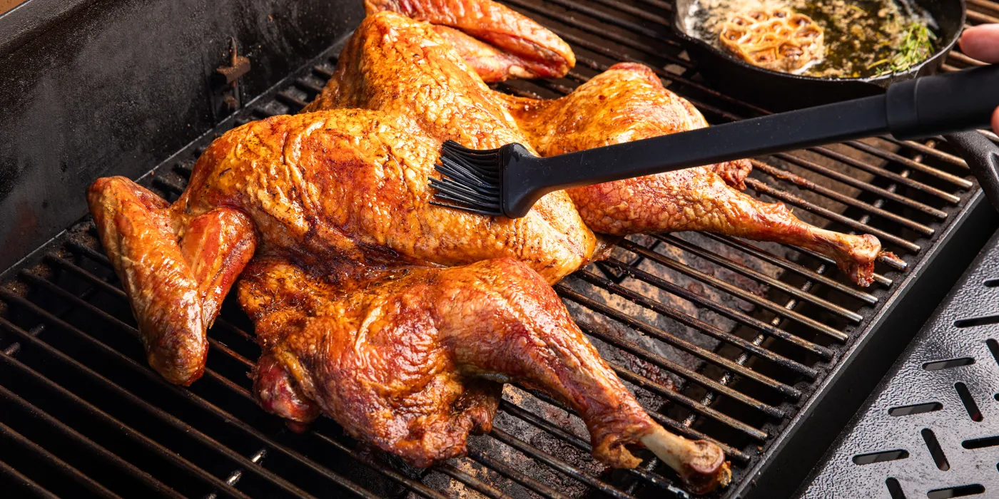 Purica na roštilju metodom spatchcock